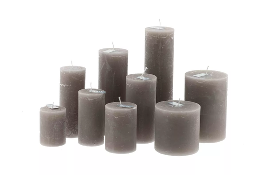 Set of nine grey Lowlands Design pillar candles in various sizes for home decoration