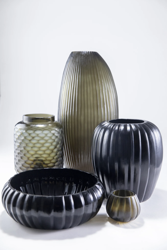 Lowlands Design candleholder set with five decorative ribbed and textured glass pieces in black and smoky green