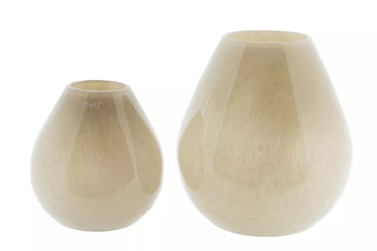 Two Lowlands Design cream ceramic vases with smooth rounded shapes for modern home decor