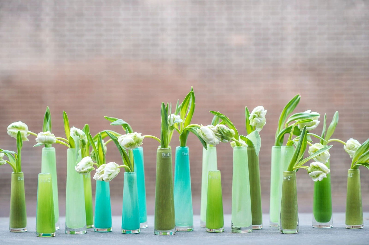 Lowlands Design Solifleur budvase collection in green and blue shades holding white flowers