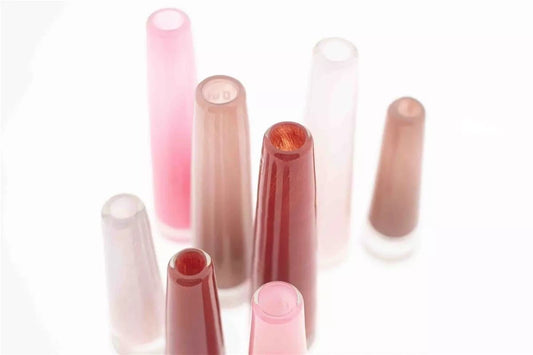 Lowlands Design Solifleur budvase set in various shades of pink and red glass for floral display