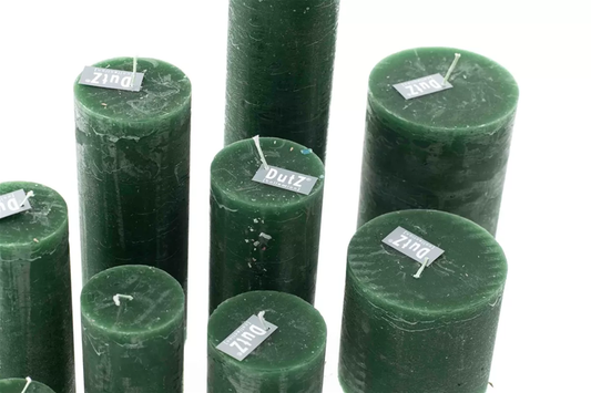Green Lowlands Design candles in various sizes with rustic texture for home decoration
