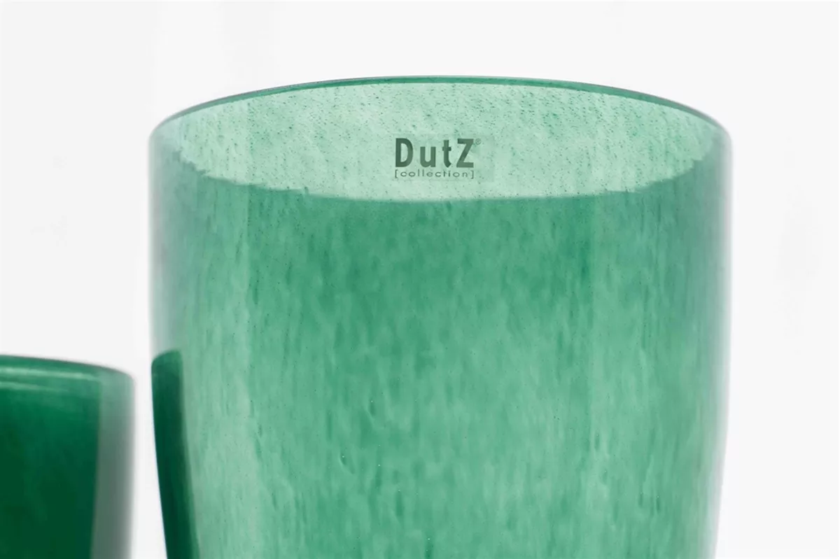 Green glass flowervase by Lowlands Design with smooth curved edges and elegant finish