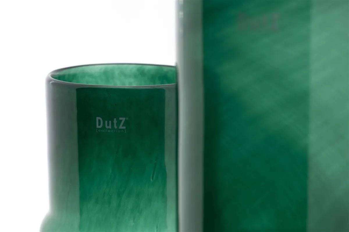 Green design vase by Lowlands Design with a smooth glossy finish