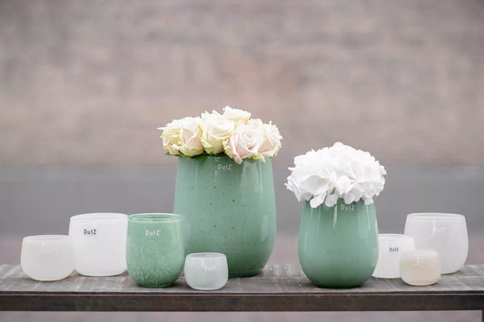 Lowlands Design mouthblown glass barrel vase in green, perfect for floral arrangements