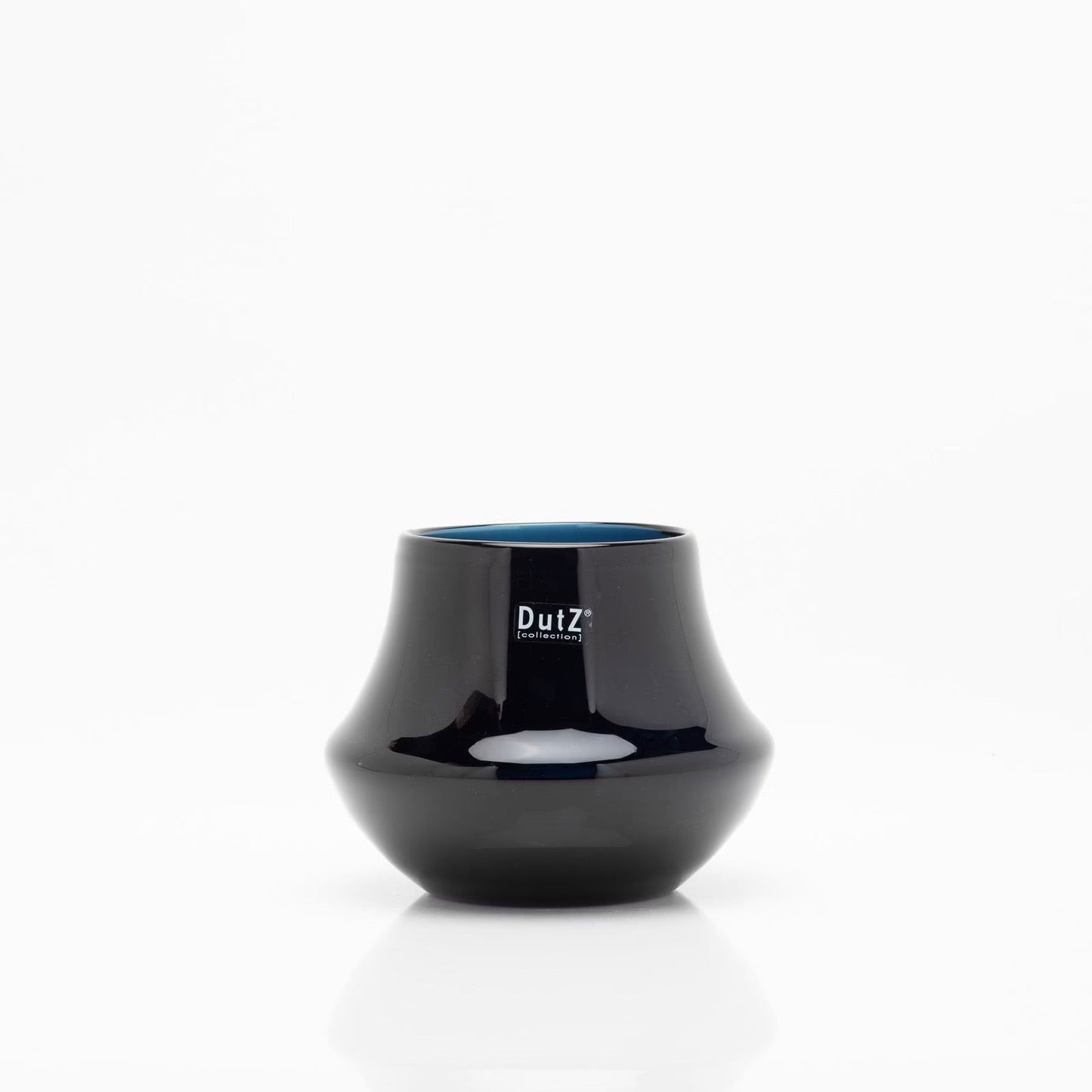 Lowlands Design black glossy orchid pot with a rounded shape and blue interior
