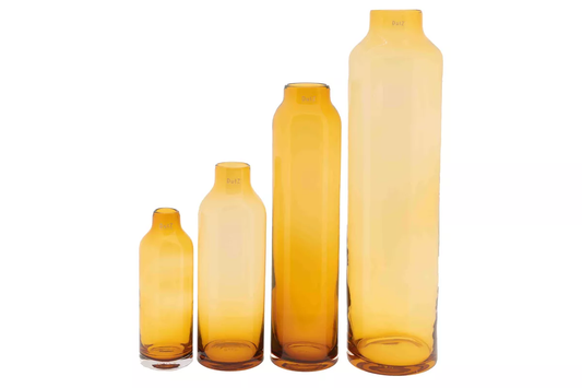 Set of four amber cylinder vases by Lowlands Design in varying heights for modern home decor
