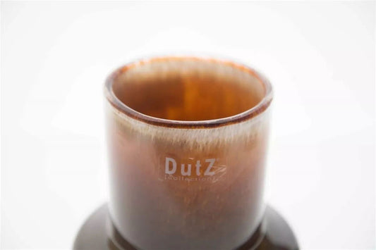 Brown Dutz glass vase by Lowlands Design with a smooth rounded rim on a white background