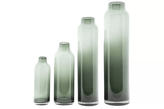 Set of four Lowlands Design glass cylinders in varying heights with gradient green colour, used as vase