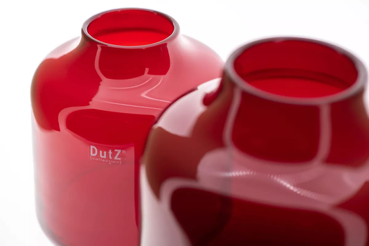 Red glass vase by Lowlands Design with smooth glossy finish and rounded shape