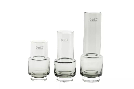 Set of three transparent glass vases from Lowlands Design with varying heights and modern cylindrical shapes