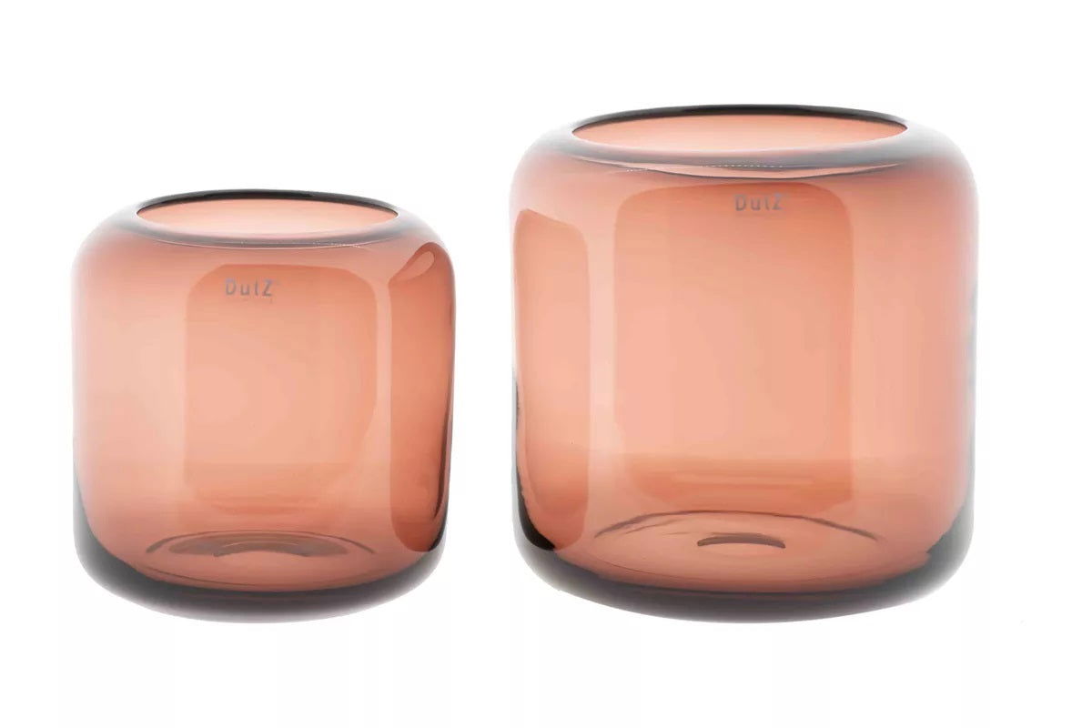 Set of two Lowlands Design glass vases in amber color with rounded cylindrical shapes