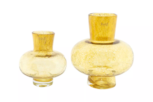 Two yellow glass vases by Lowlands Design with textured bubble patterns and wide rounded bases