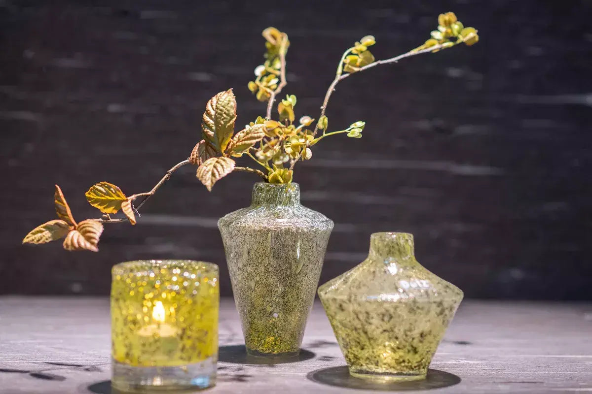 Lowlands Design glass diffuser vase with decorative branches and candle for elegant home decor