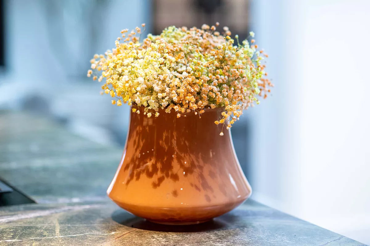 Lowlands Design flowervase glass mouthblown featuring a stylish shape with dried flowers