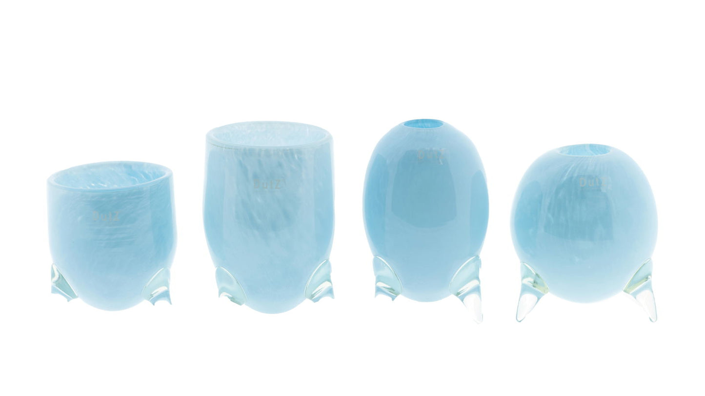 Lowlands Design vase set glass feet with four blue glass vases in varying shapes and sizes