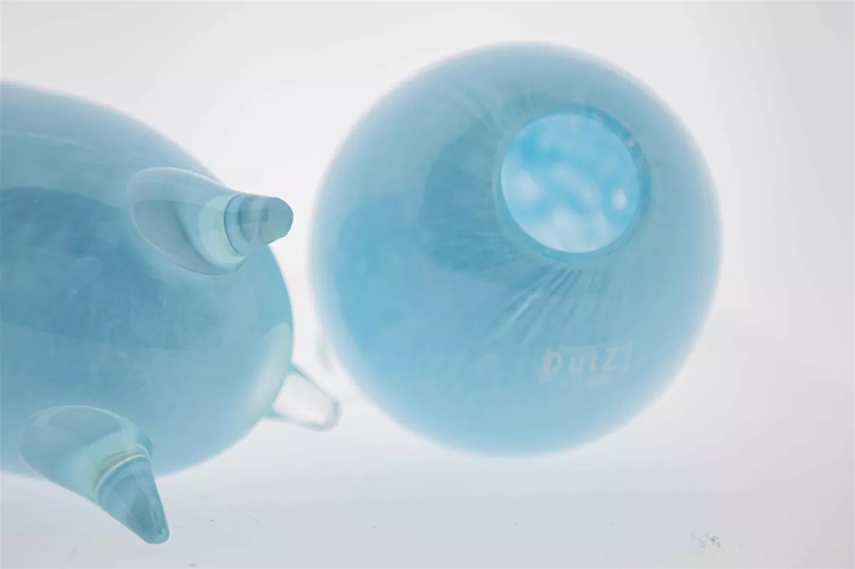 Lowlands Design vase set glass feet in translucent blue with rounded shapes and smooth finish
