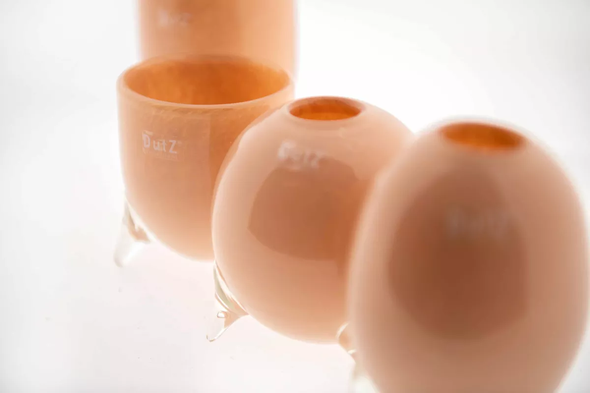Lowlands Design vase set glass feet in soft peach tones with unique glass footed bases