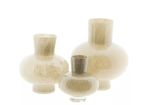 Set of three elegant beige Lowlands Design vases with smooth round shapes for modern home decor