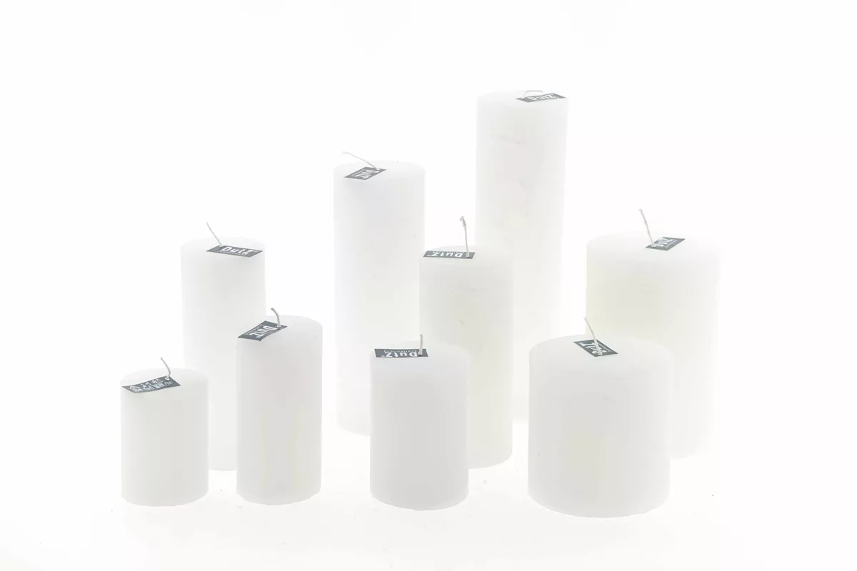 Set of white candles by Lowlands Design in various sizes for home decoration and ambiance