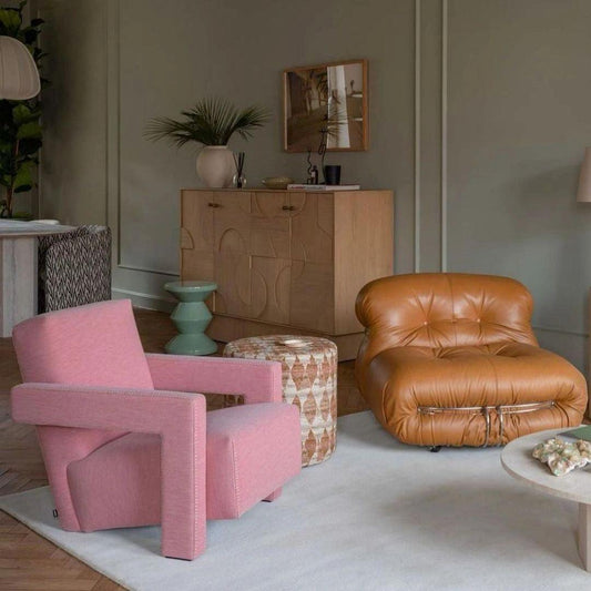 Living room featuring stylish pink and brown chairs showcasing modern dutch design furniture elements