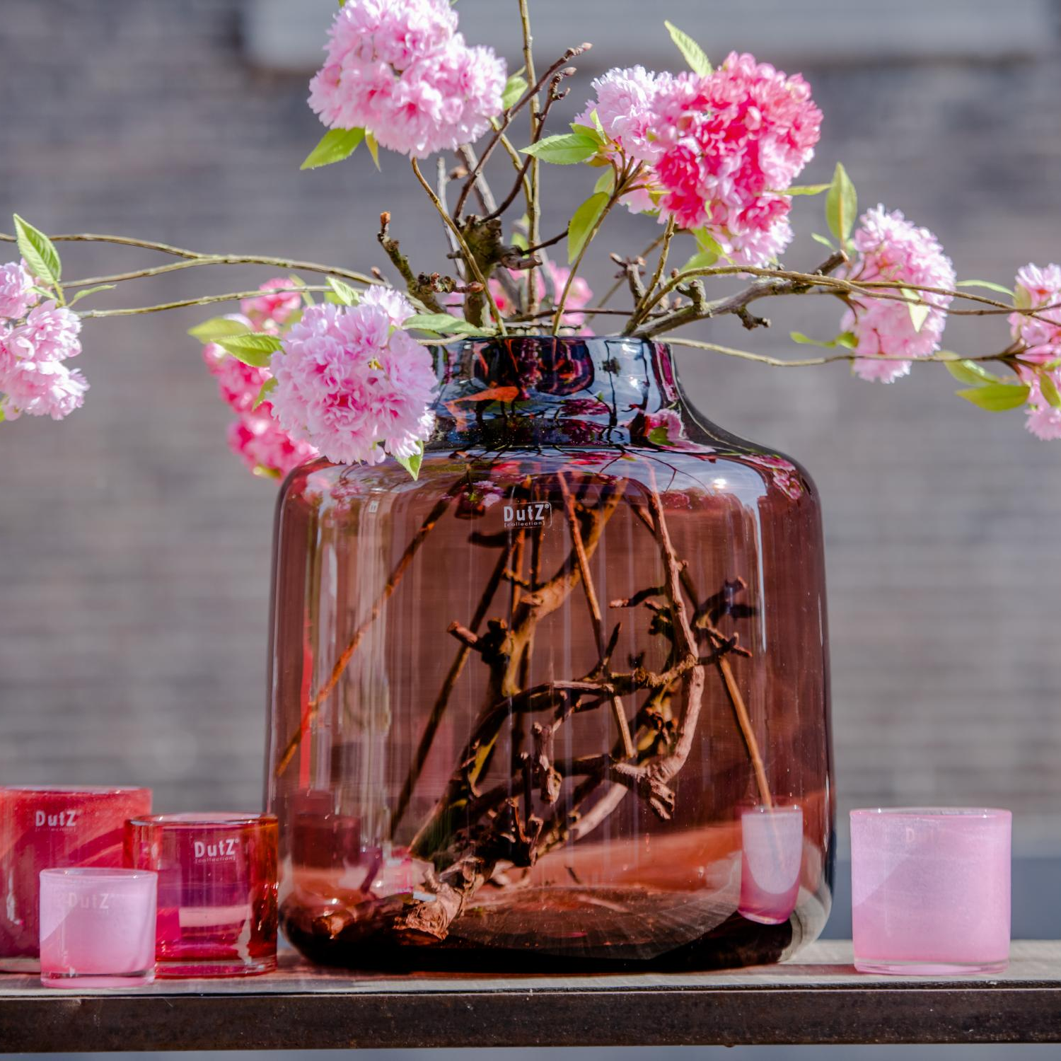 Decor vases featuring two luxury mouth blown glass designs with rich amber patterns, perfect for elegant home decor