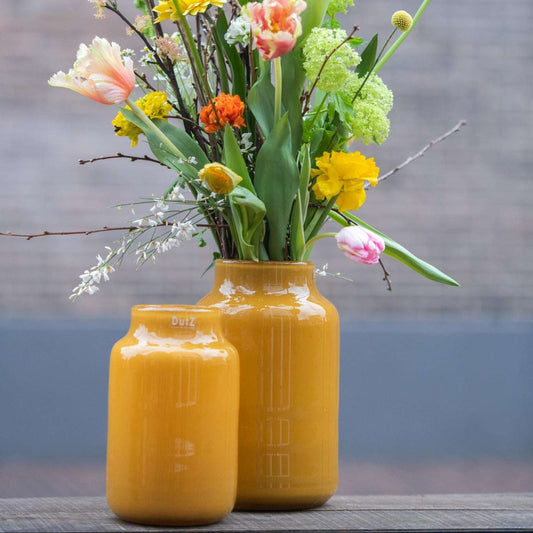 Lowlands Design Apothecary Glass Vase in Yellow with Colourful Flowers for Home Decor