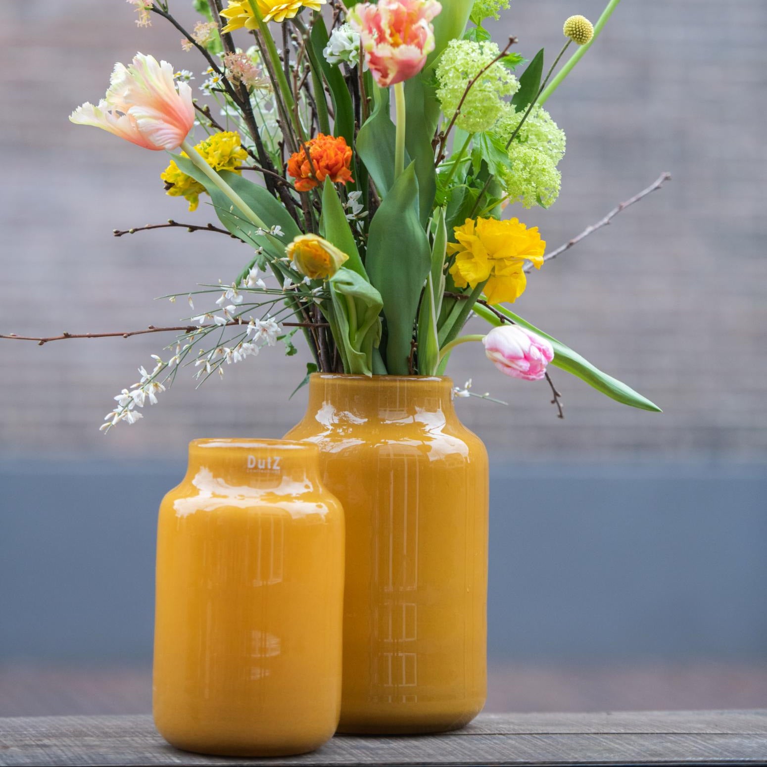 Lowlands Design Apothecary Glass Vase in Yellow with Colourful Flowers for Home Decor