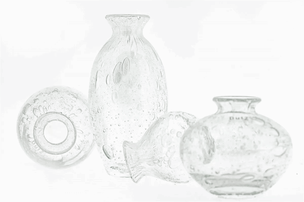 Lowlands Design clear glass vase set with textured bubble patterns in various shapes and sizes