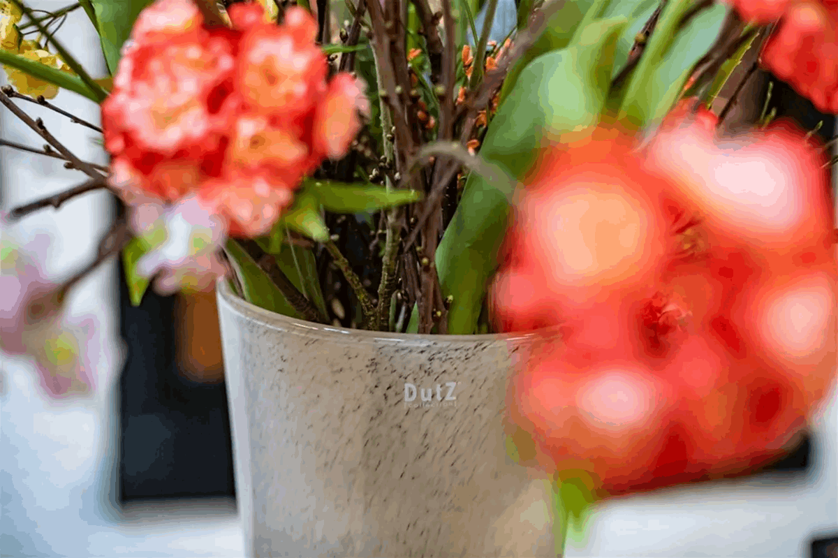 Lowlands Design Flowervase glass mouthblown featuring vibrant flowers and a stylish design