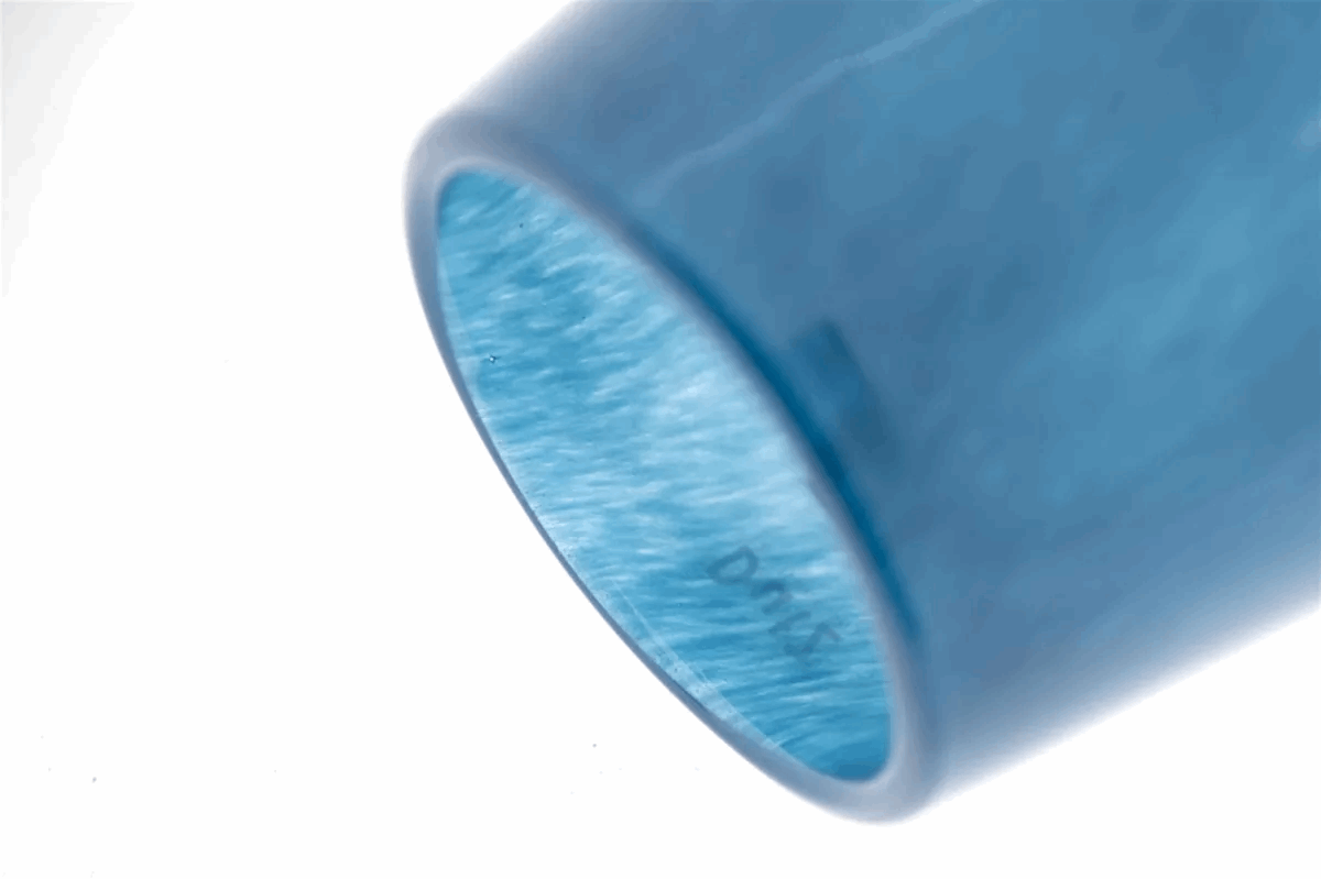 Elegant Lowlands Design glass flower vase in a serene blue hue, perfect for showcasing fresh flowers