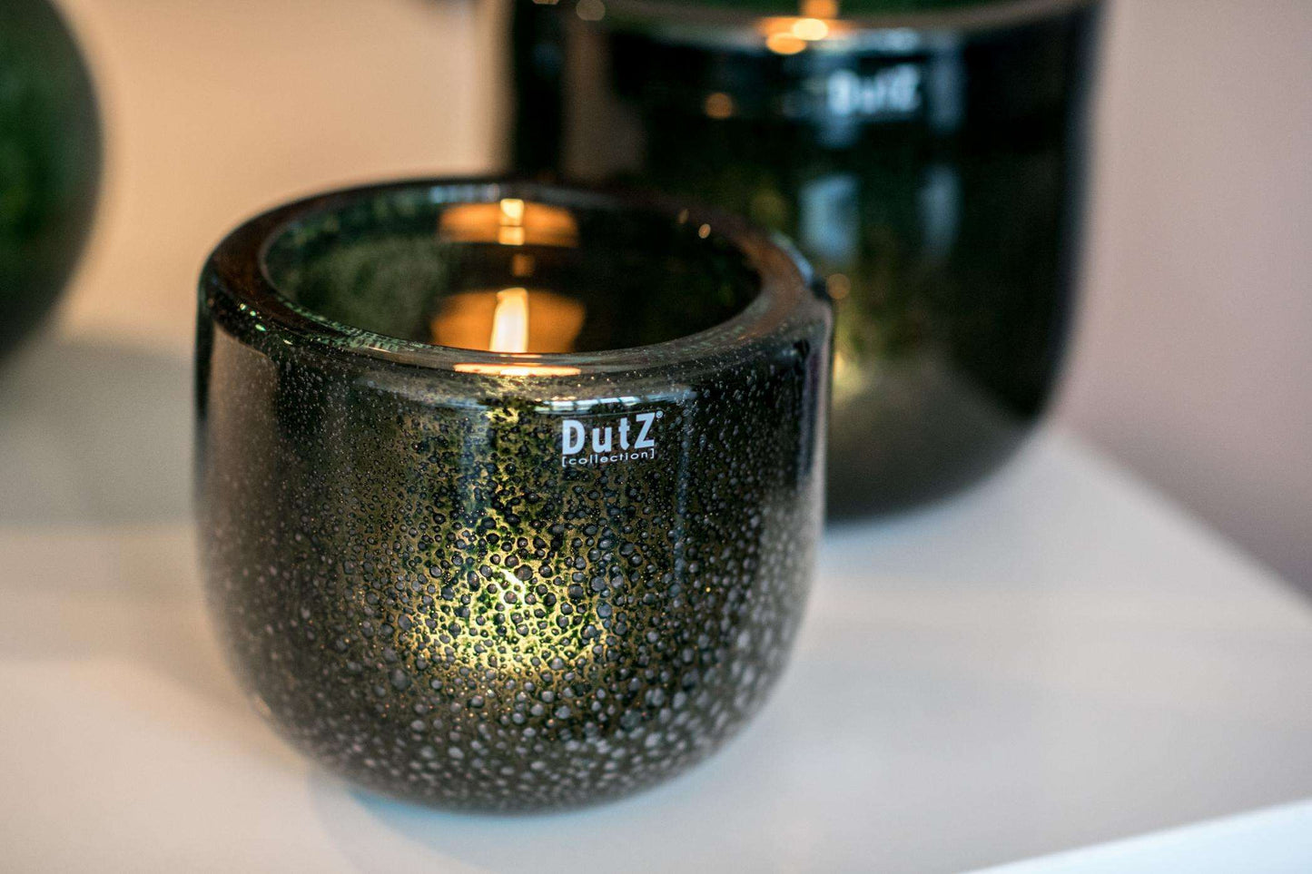 Lowlands Design Bowl THICK Glass with a textured surface and dark green finish