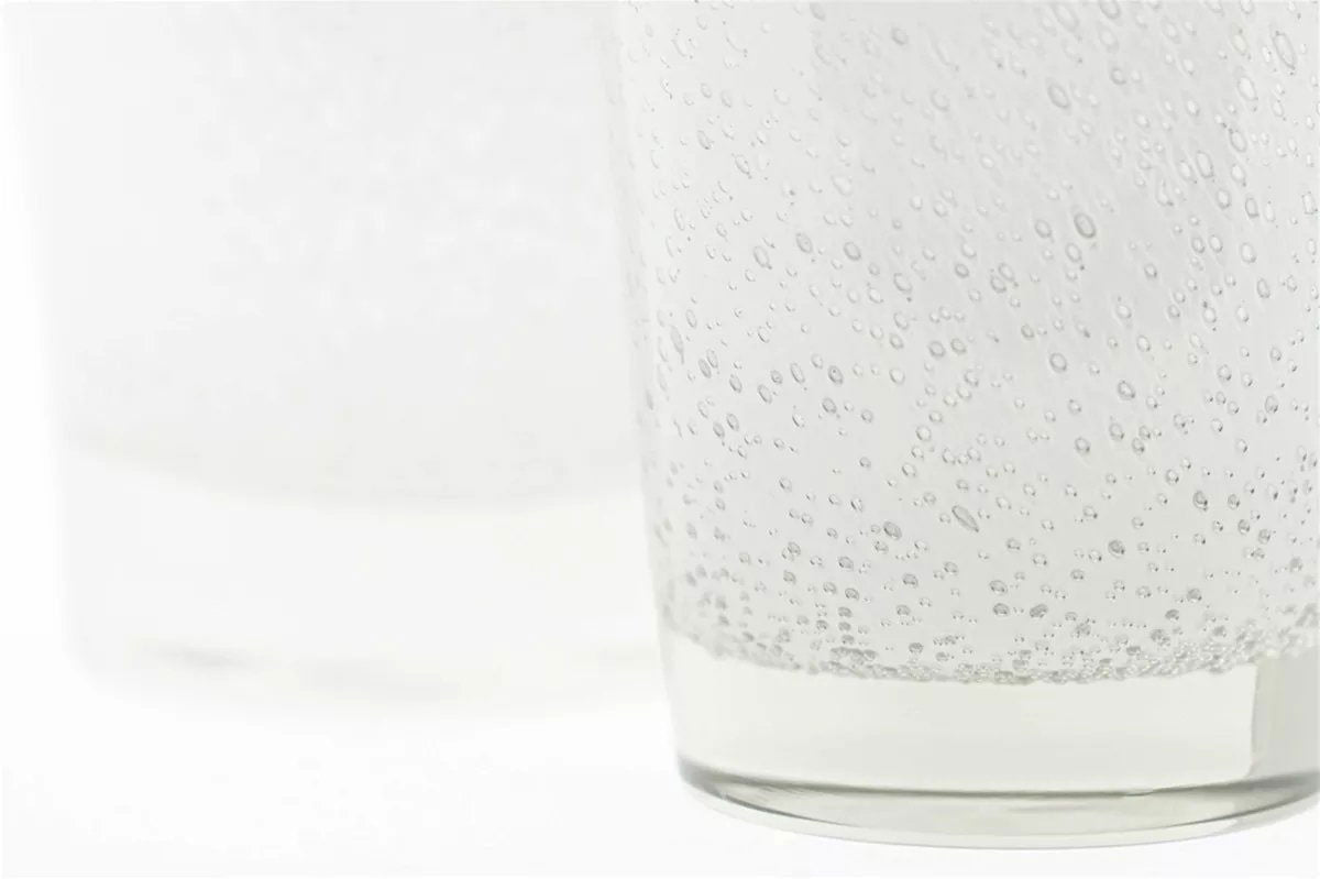 Close-up of Lowlands Design conic vase with textured bubble glass detailing
