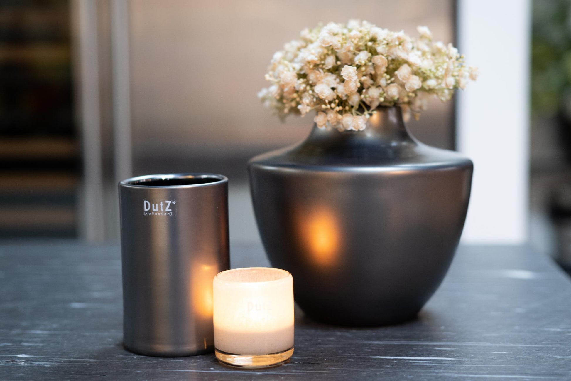 Stylish Lowlands Design vase in dark glass, featuring glass mouthblown dutz for elegant home decor