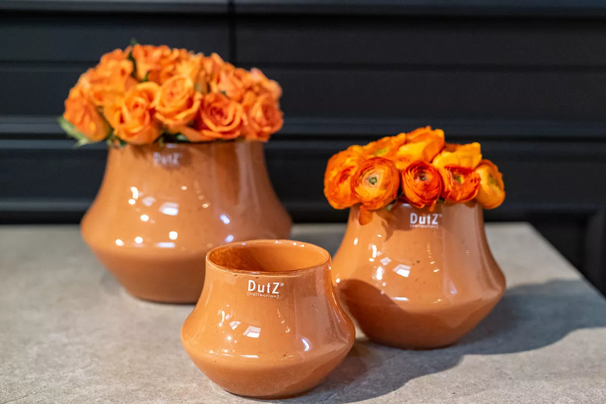 Lowlands Design Glass Orchid Pot in terracotta colour, ideal for displaying flowers elegantly