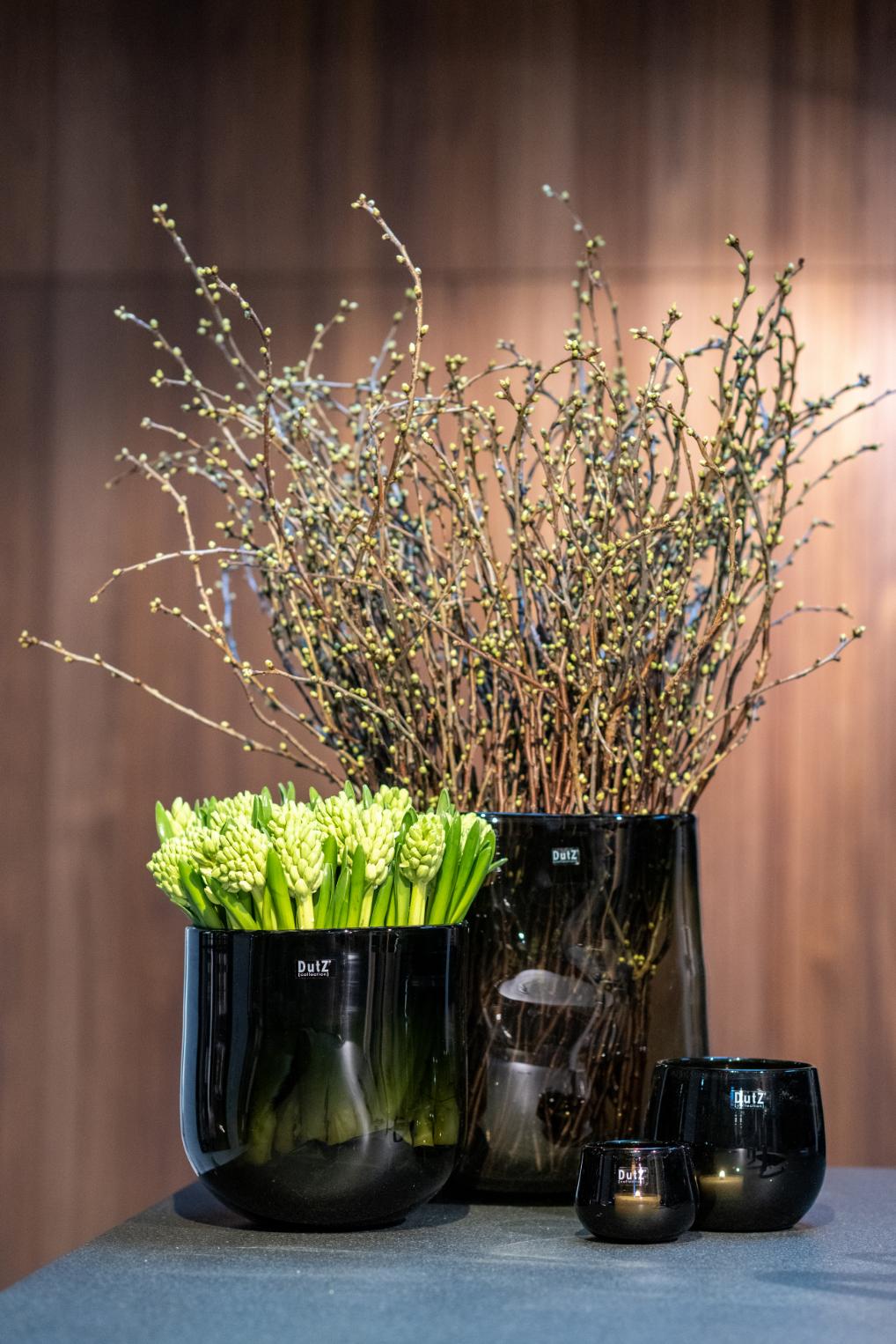 Lowlands Design glass oval vase displayed with flowers and decorative elements in a stylish setting