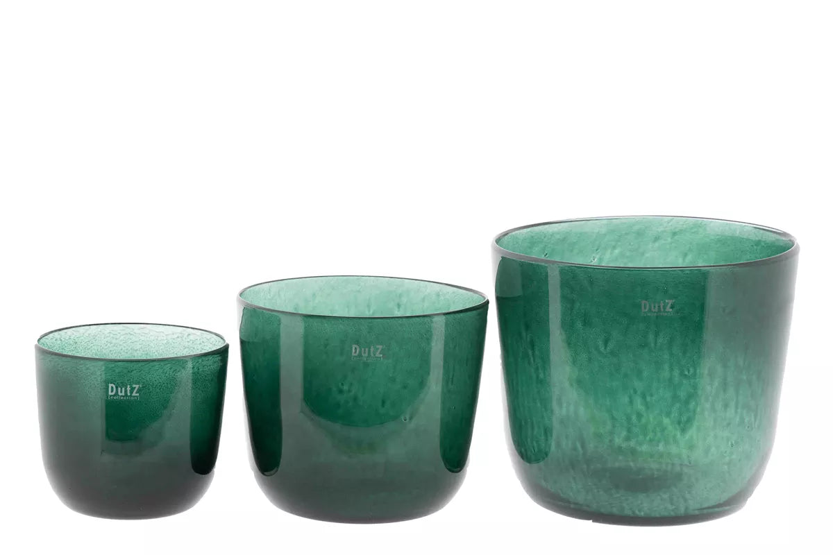 Three green glass plant pots from Lowlands Design with varying sizes, perfect for stylish indoor plants