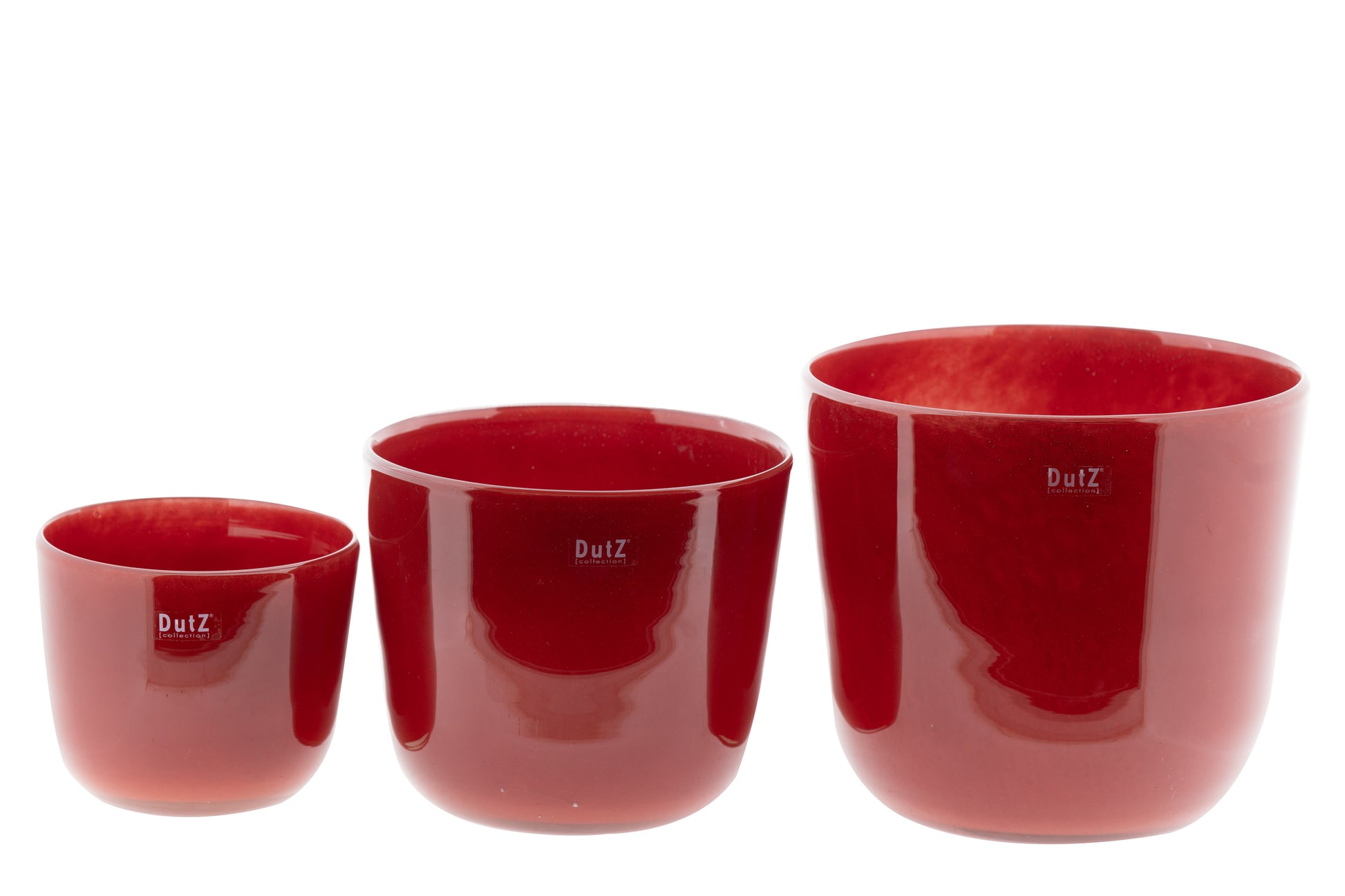 Set of three glass purple plant pots by Lowlands Design in various sizes for stylish indoor gardening