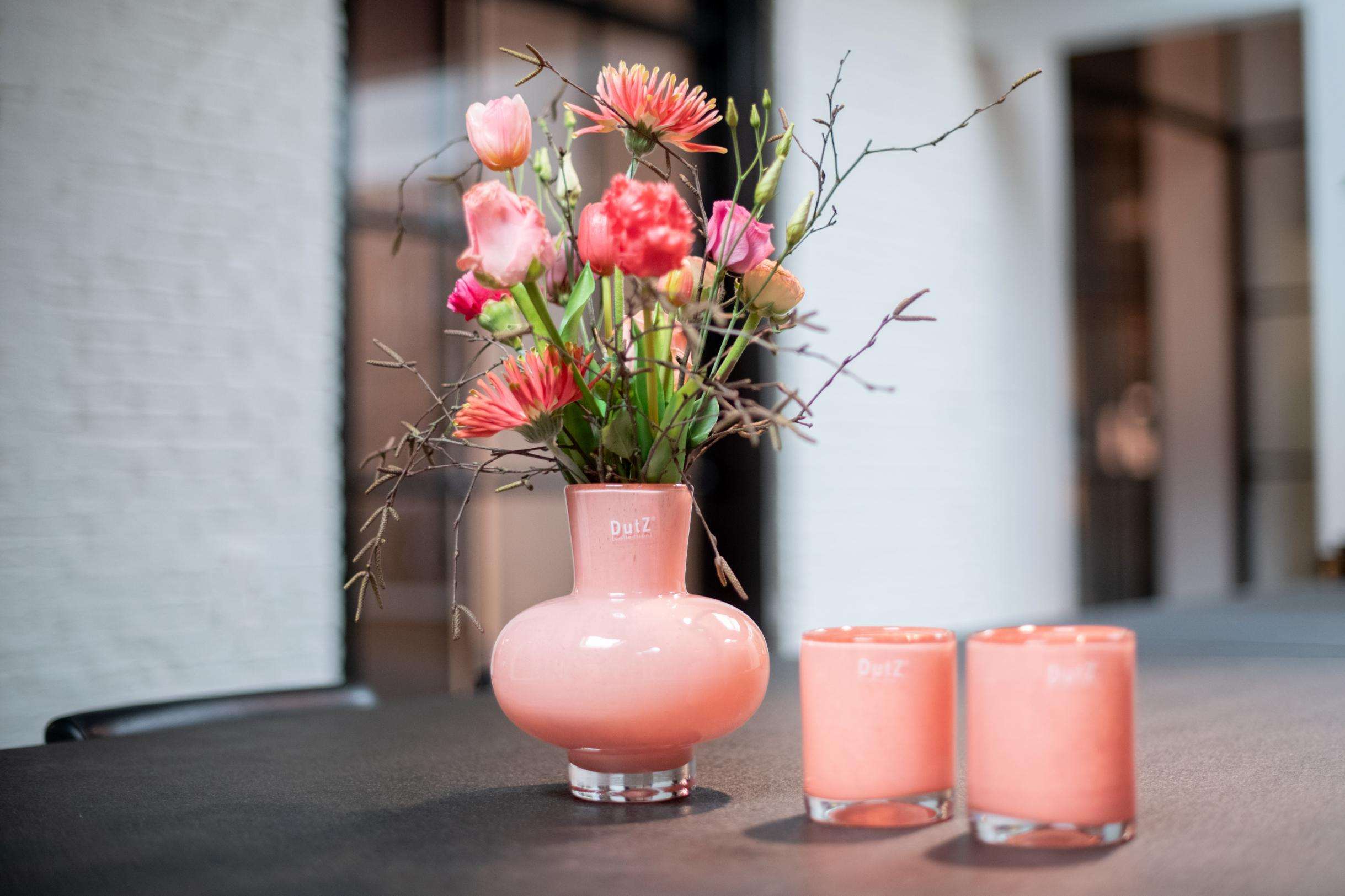 Lowlands Design mouth blown glass vase in pink, 25cm tall with fresh flowers