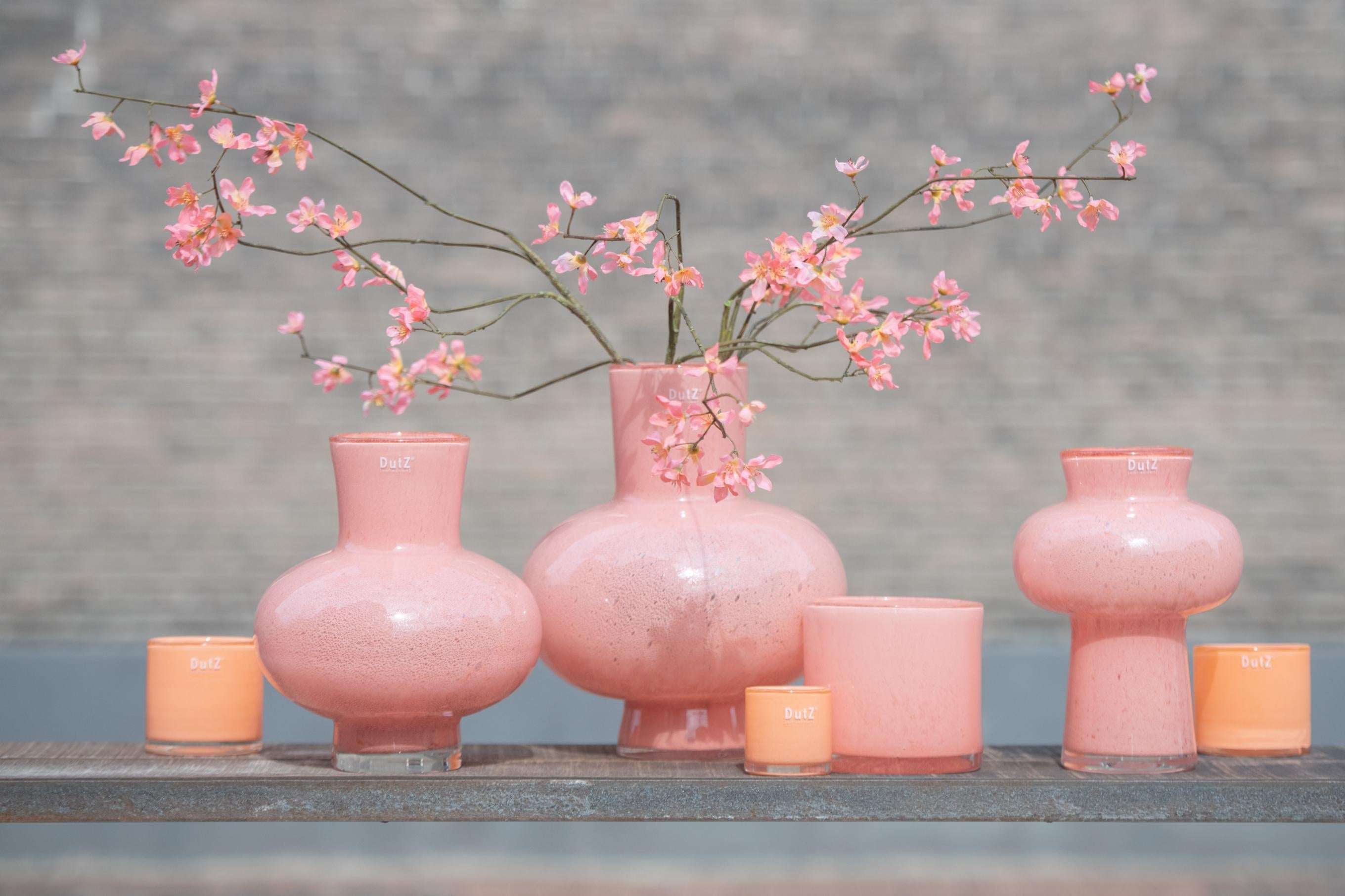 Lowlands Design mouth blown glass vase in pink, various sizes with floral arrangement