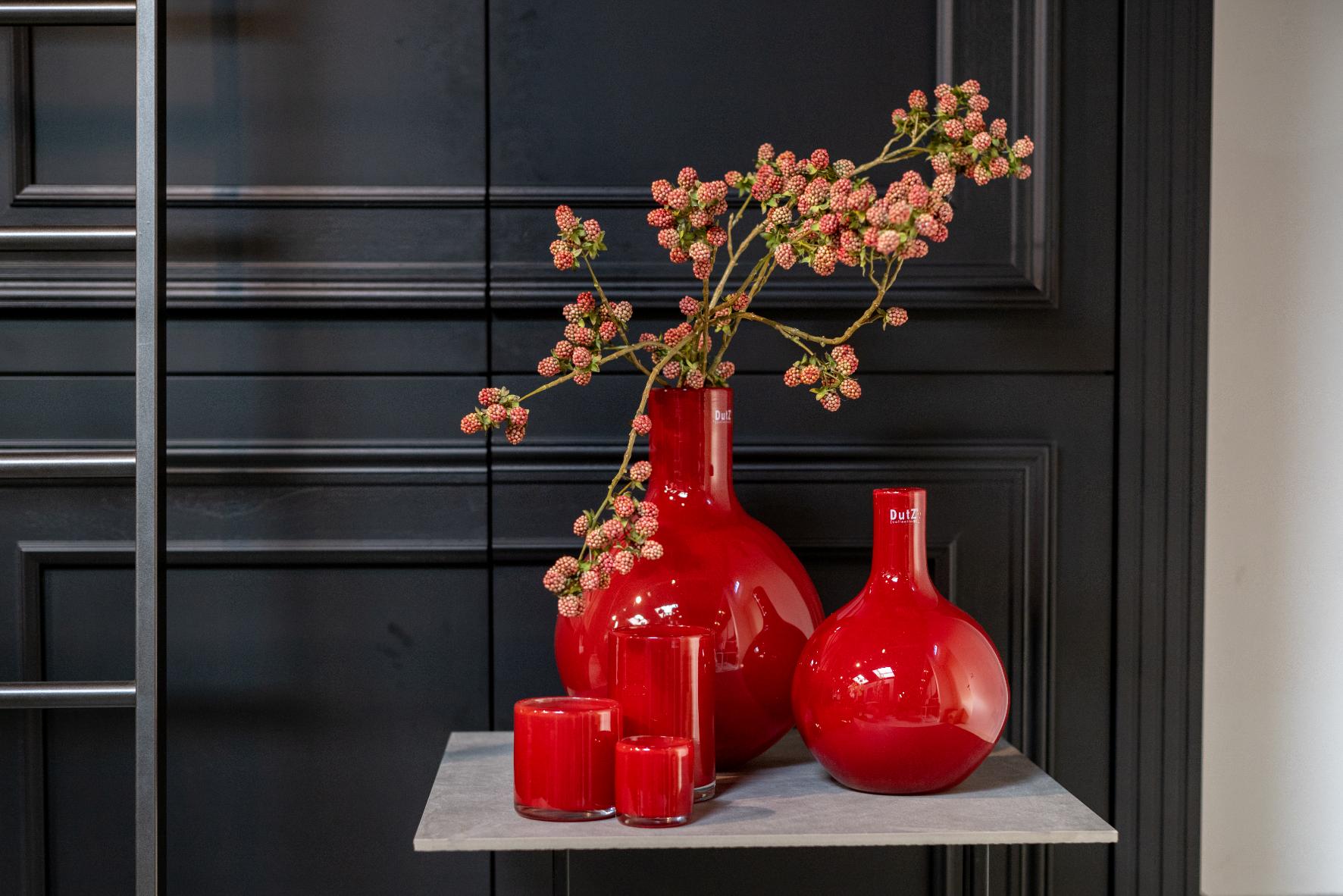 Stylish Lowlands Design mouthblown glass bottle vase with red finish and decorative flowers