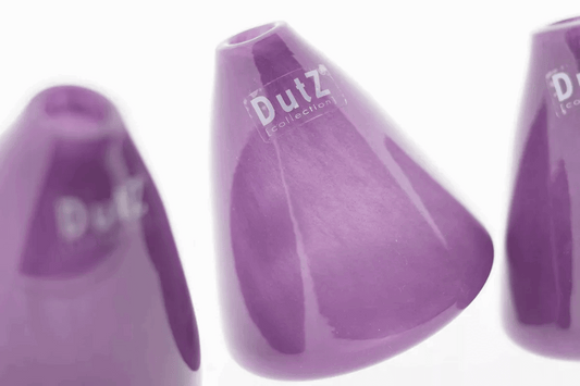 Purple tumbling vase from Lowlands Design with glossy finish and modern round shape