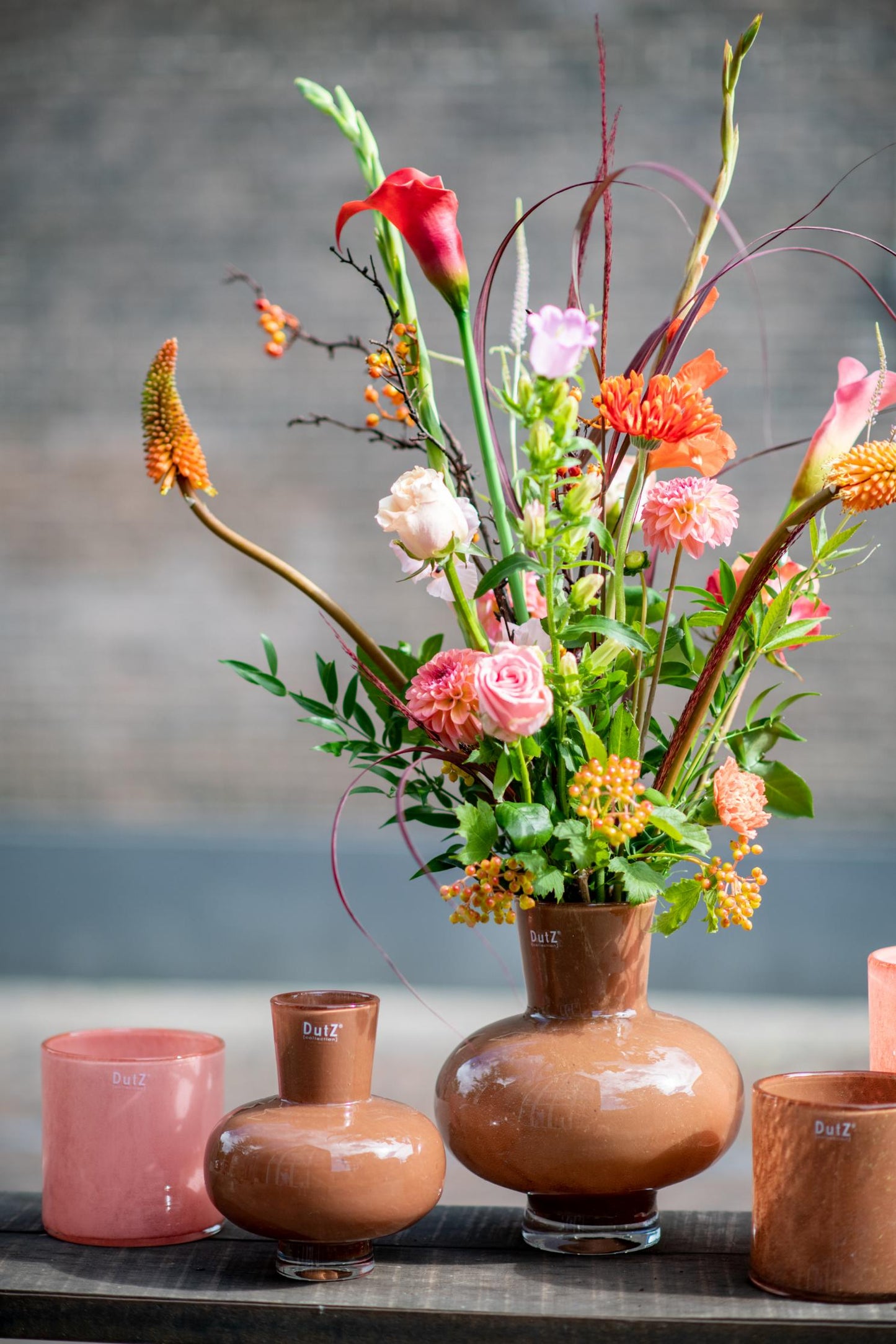 Lowlands Design vase flower bouquet glass featuring vibrant flowers in a stylish ceramic vase