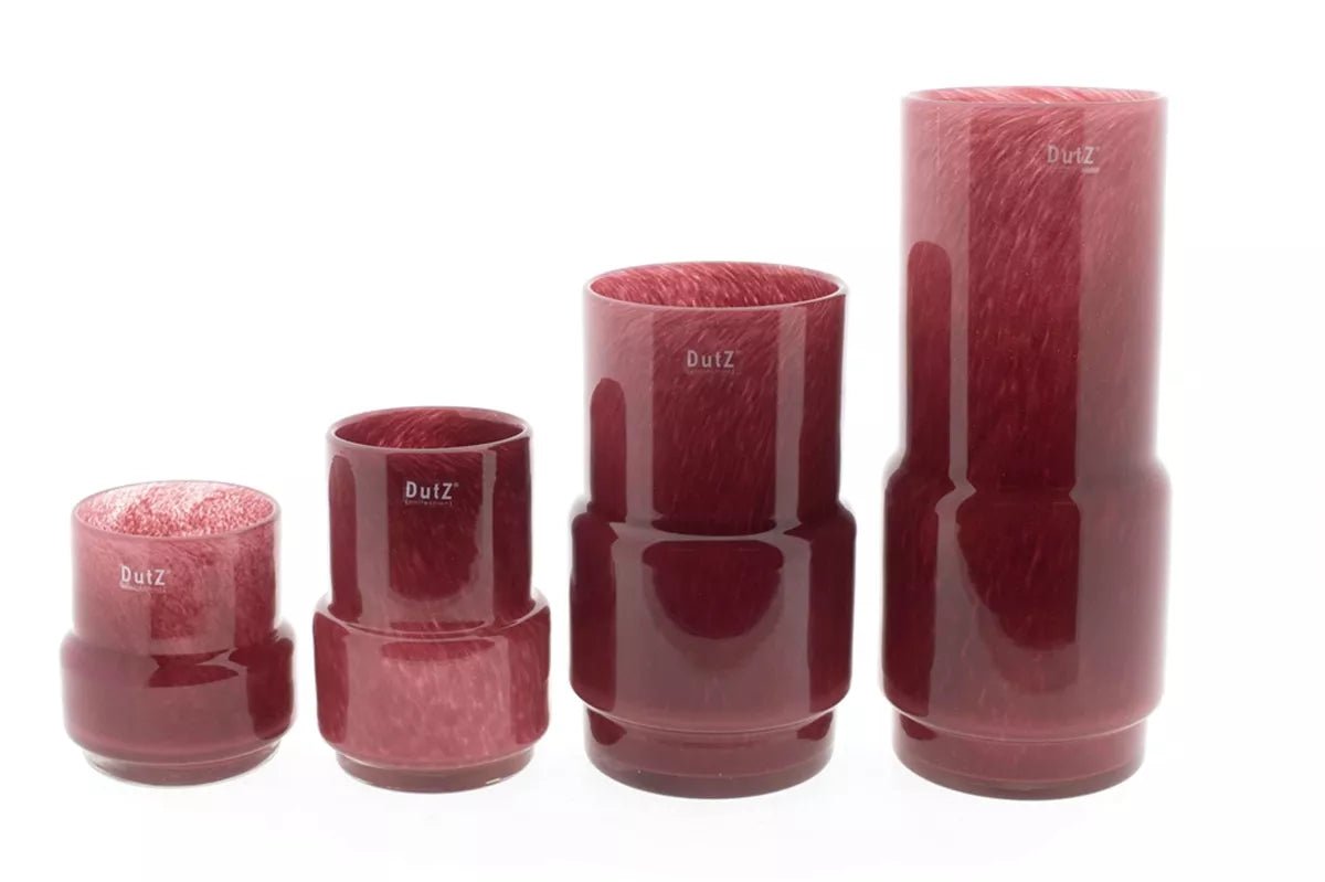 Set of four burgundy design vases by Lowlands Design in varying cylindrical shapes and sizes