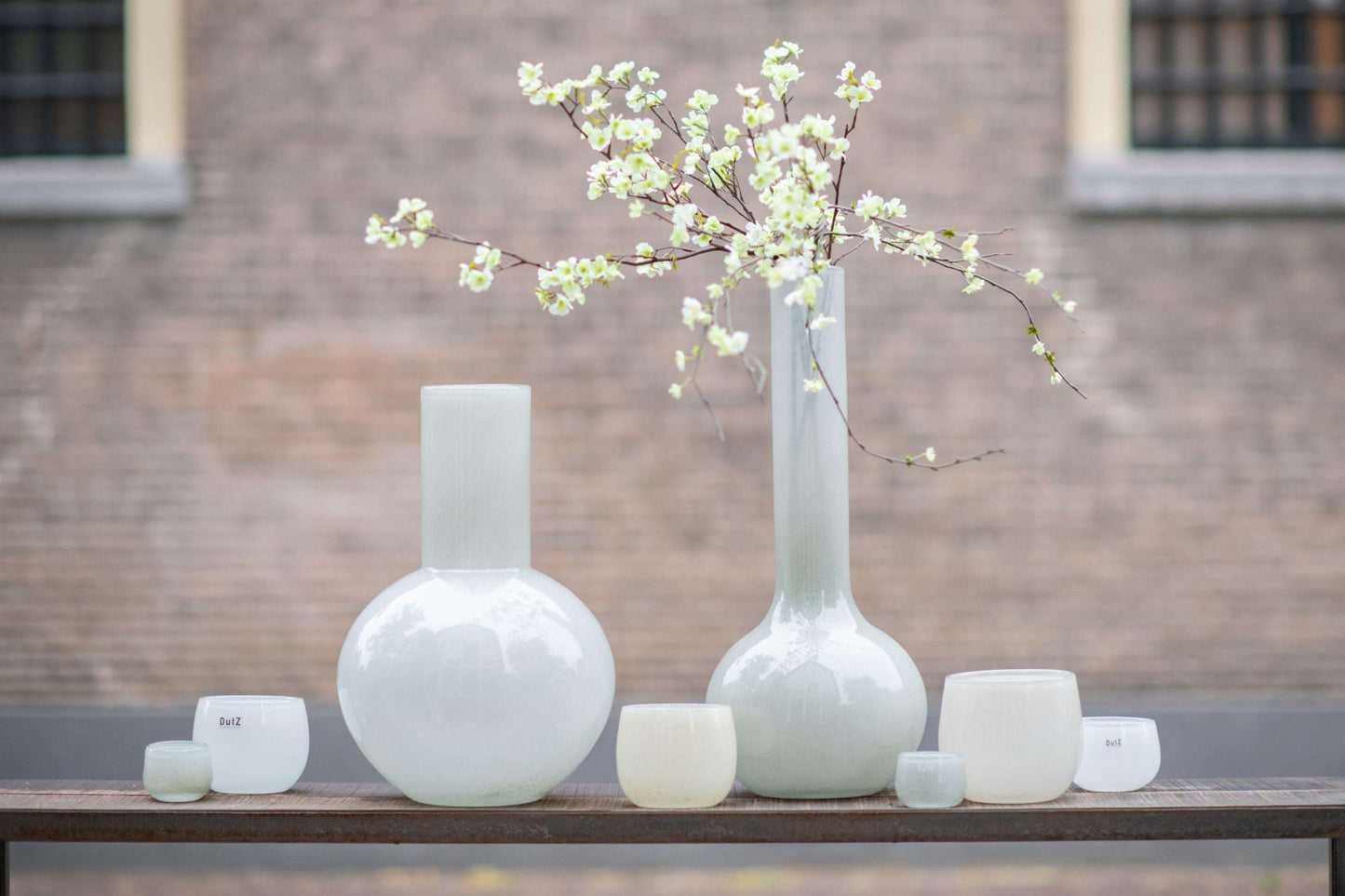 Flowervase glass grey collection by Lowlands Design with delicate branches in stunning vases