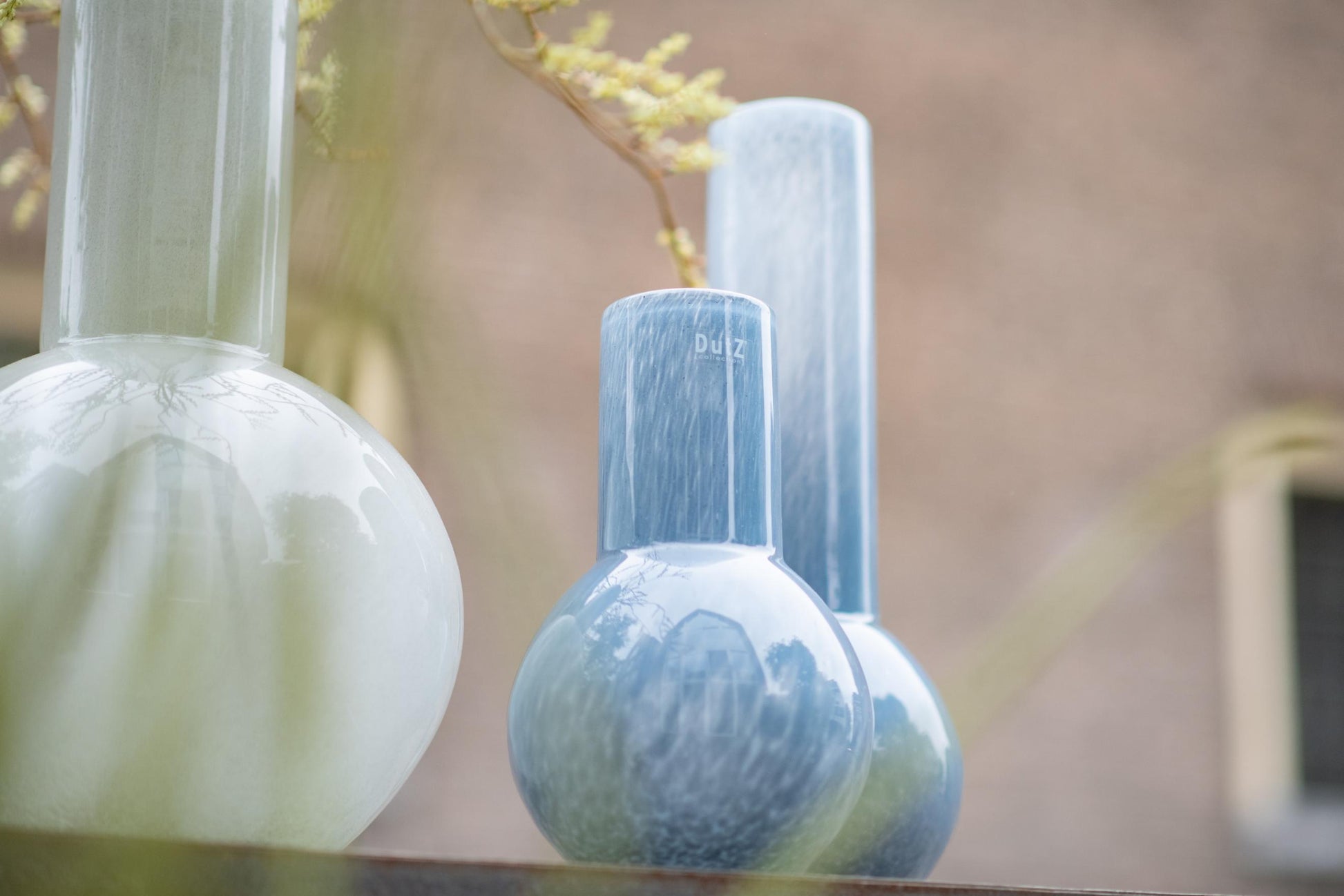 Stylish flowervase glass grey by Lowlands Design with modern shapes and colours