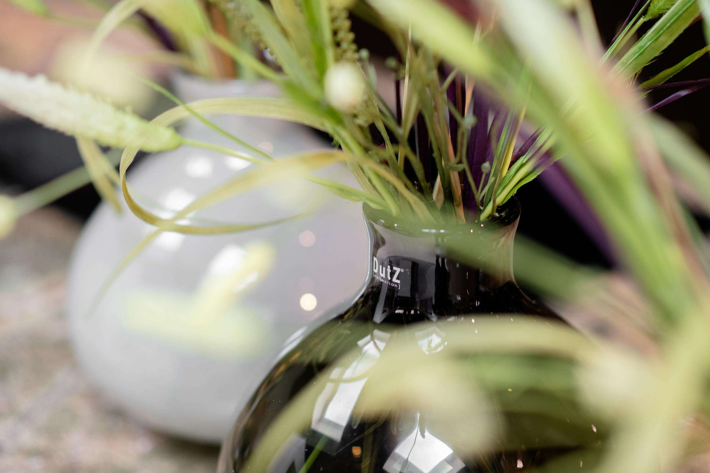 Lowlands Design glass lighgrey vase with decorative greenery for a modern home decor look