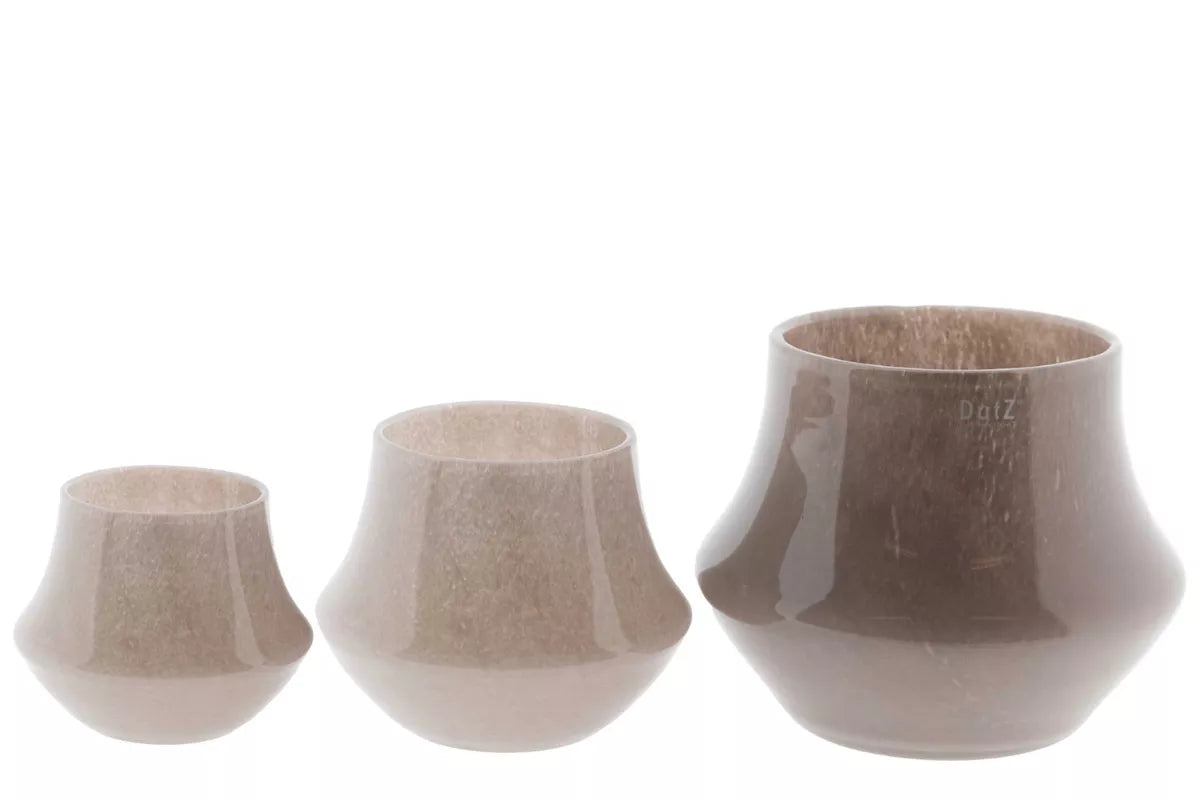 Set of three DutZ glass orchid pots in various sizes with a sleek, modern design