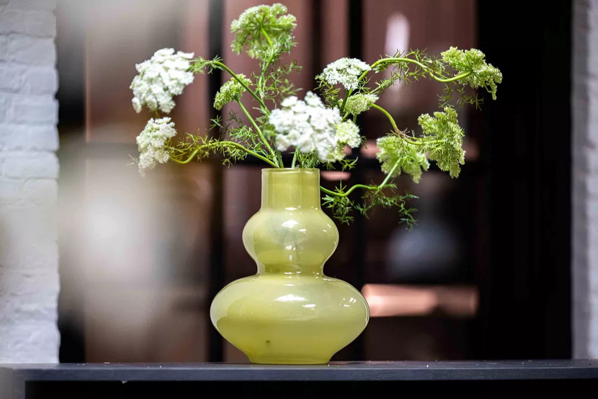 Lowlands Design modern chartreuse vase for living room glossy gourd shaped vase with white Queen Annes lace on windowsill