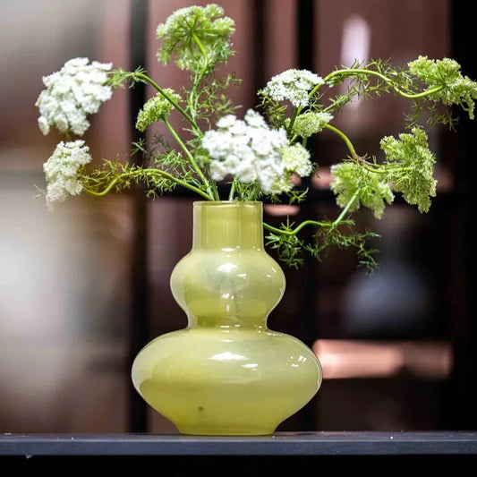 Lowlands Design modern chartreuse vase for living room glossy gourd shaped vase with white Queen Annes lace on windowsill